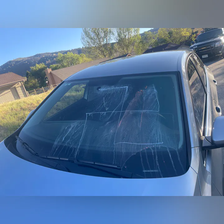 May contain: car, transportation, vehicle, and windshield